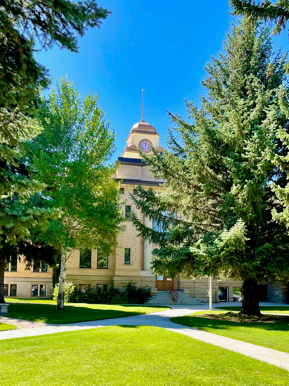 a large building with a clock on the top of it