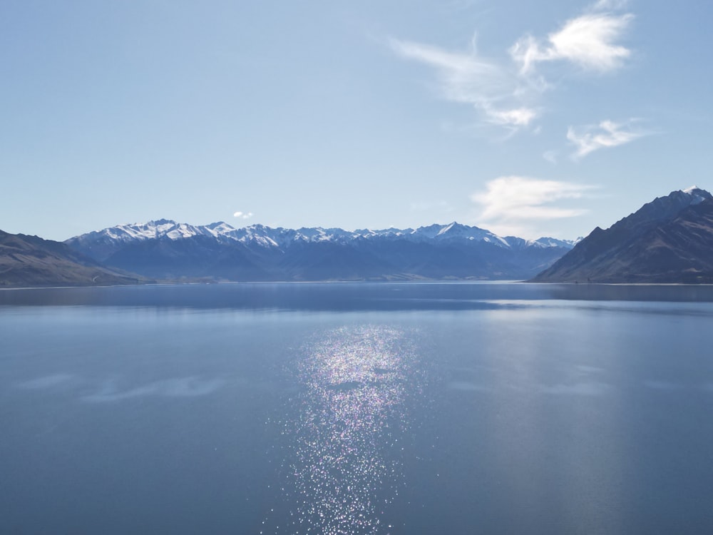 a large body of water surrounded by mountains