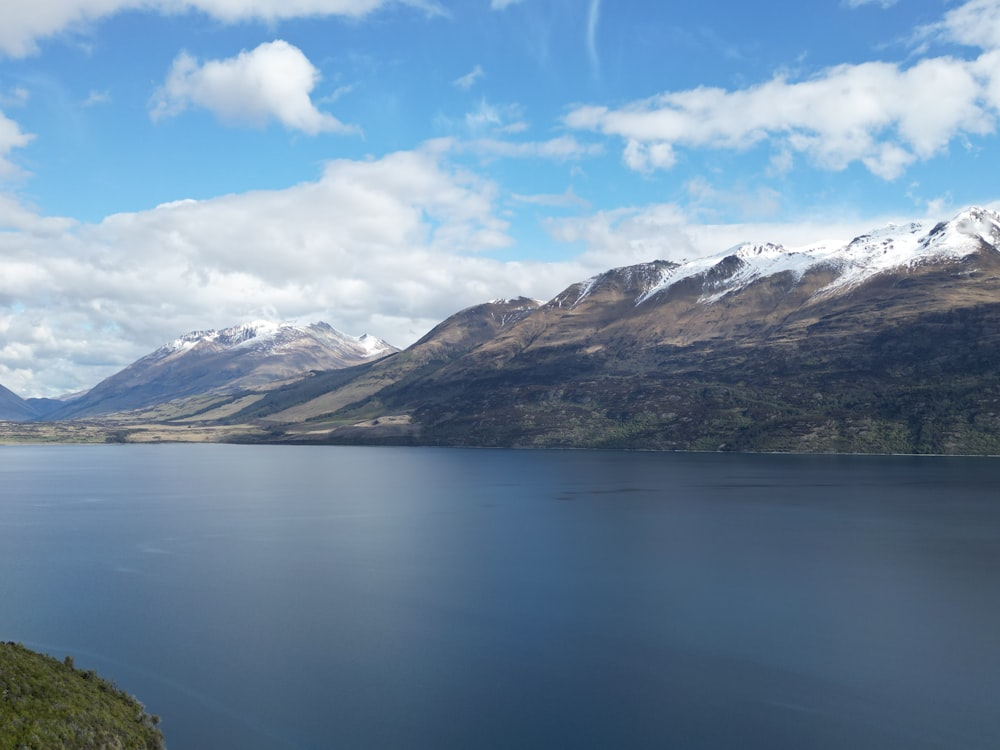 a large body of water surrounded by mountains