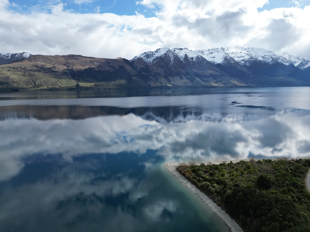 a large body of water surrounded by mountains