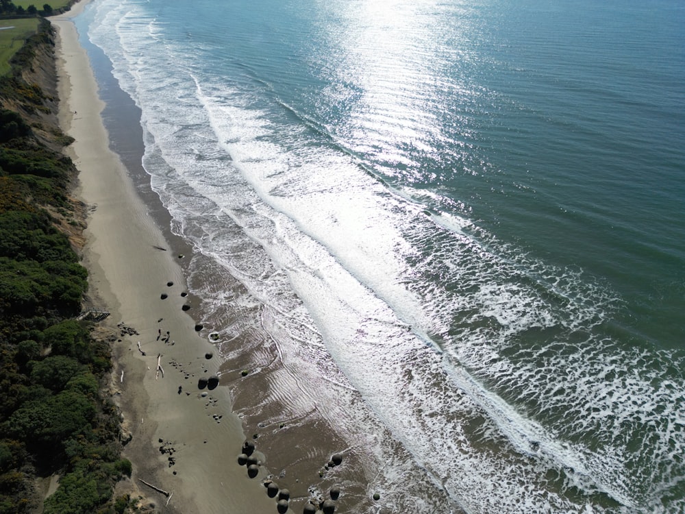 an aerial view of a beach and the ocean