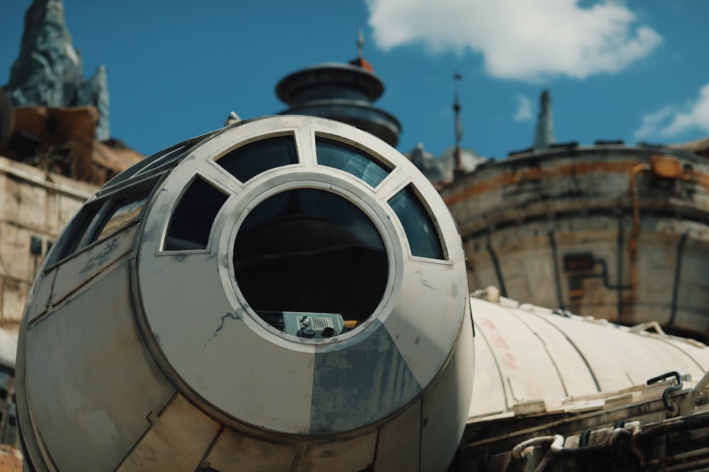 a close up of a star wars vehicle with a sky background