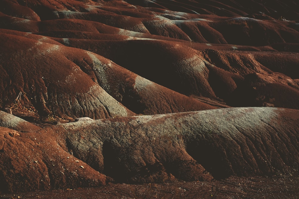 a group of hills that are covered in dirt