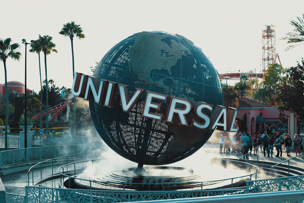 a large globe with the word universal on it