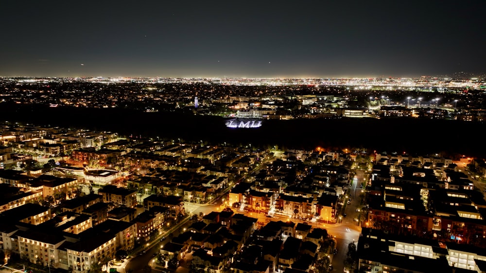 a view of a city at night from the top of a building