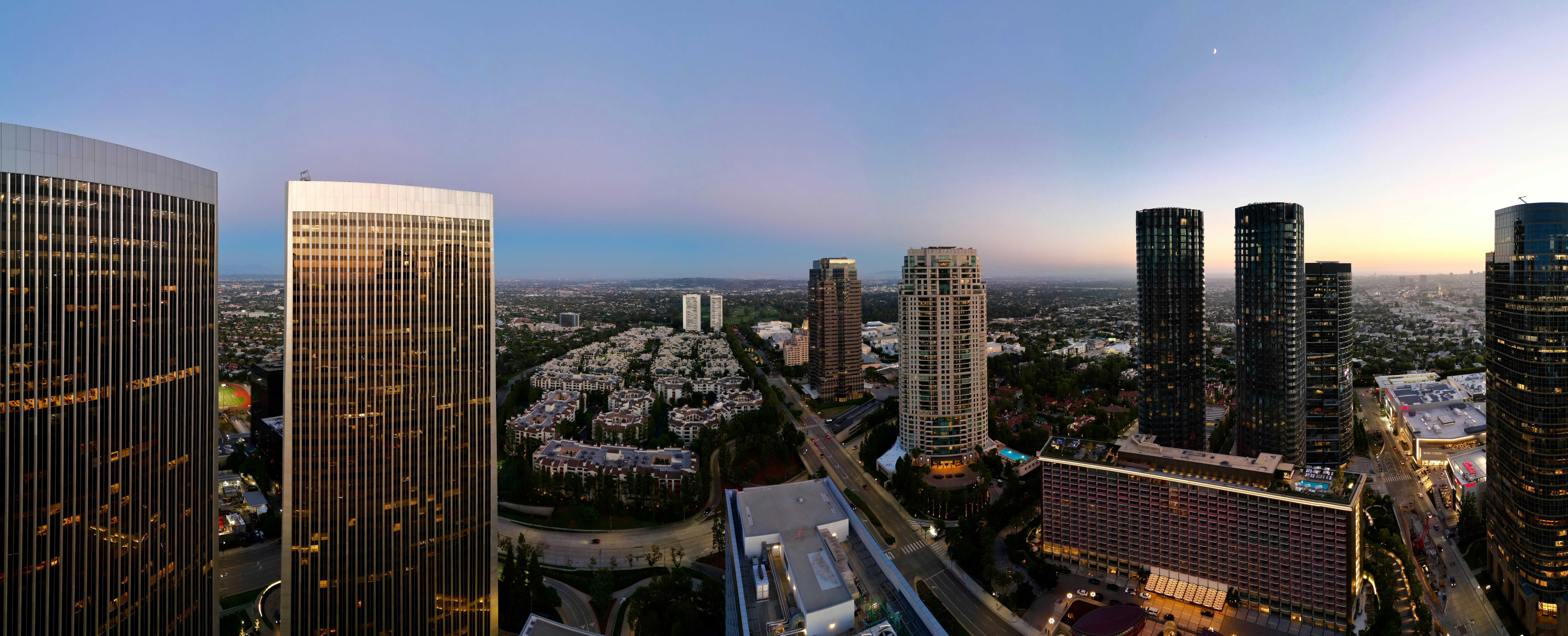 an aerial view of a city with skyscrapers