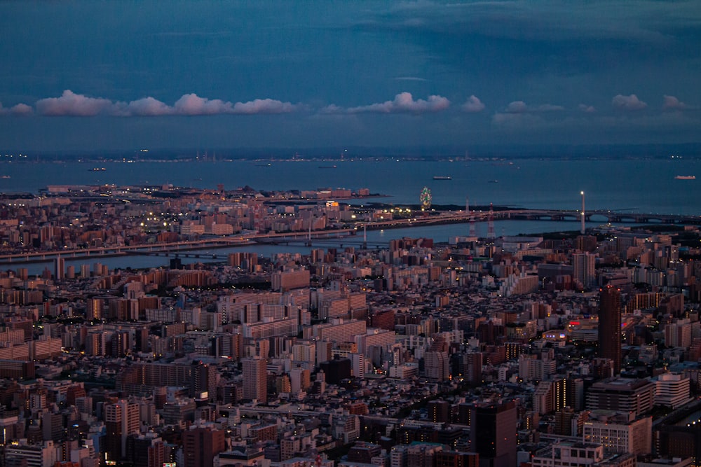 a view of a city at night from the top of a building