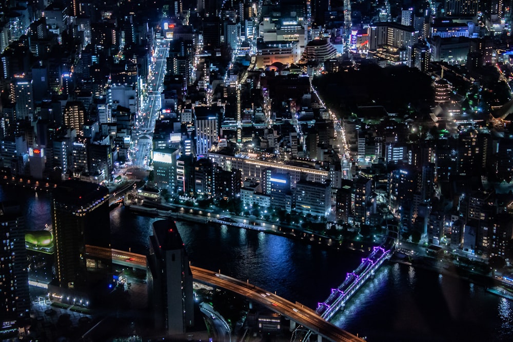 an aerial view of a city at night