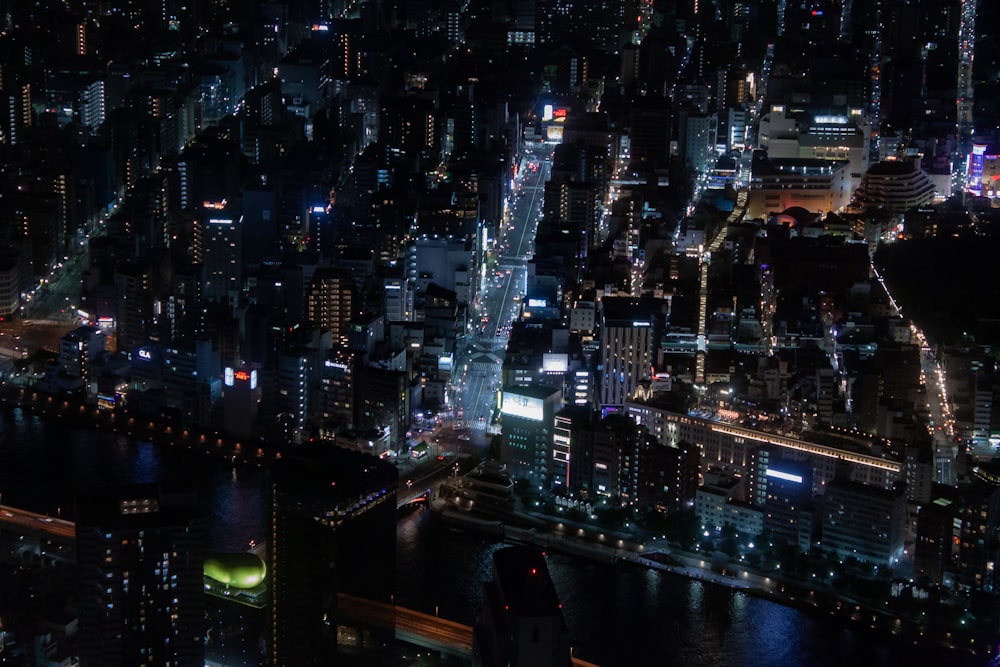 an aerial view of a city at night