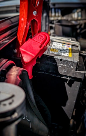 Close-up of a durable automotive battery charger in action.