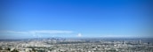 A panoramic view of Mohali city skyline under a clear blue sky.