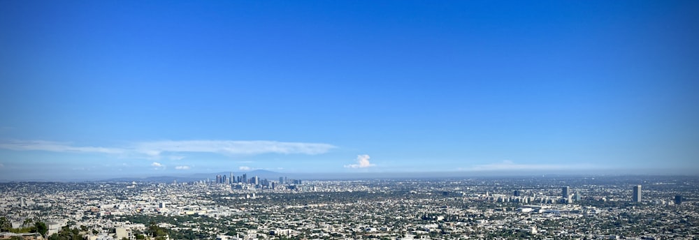 a view of a city from the top of a hill