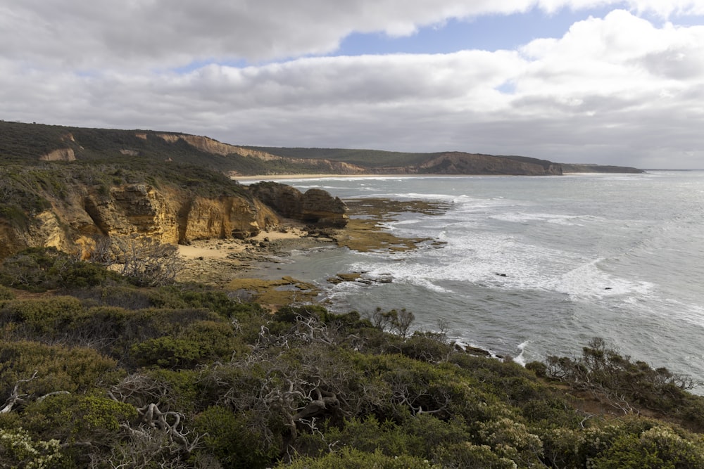 a view of the ocean from a cliff