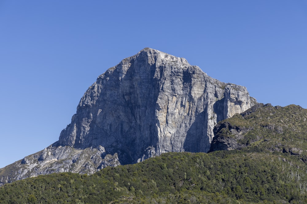 a large mountain with a very tall peak