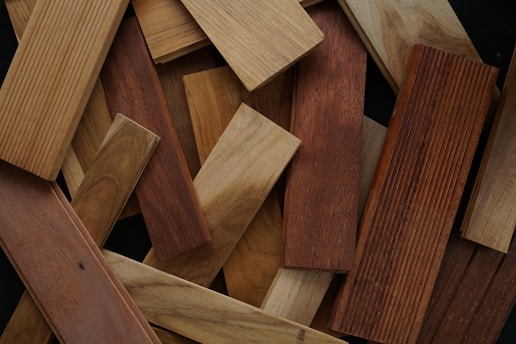 a pile of wooden planks laying on top of each other