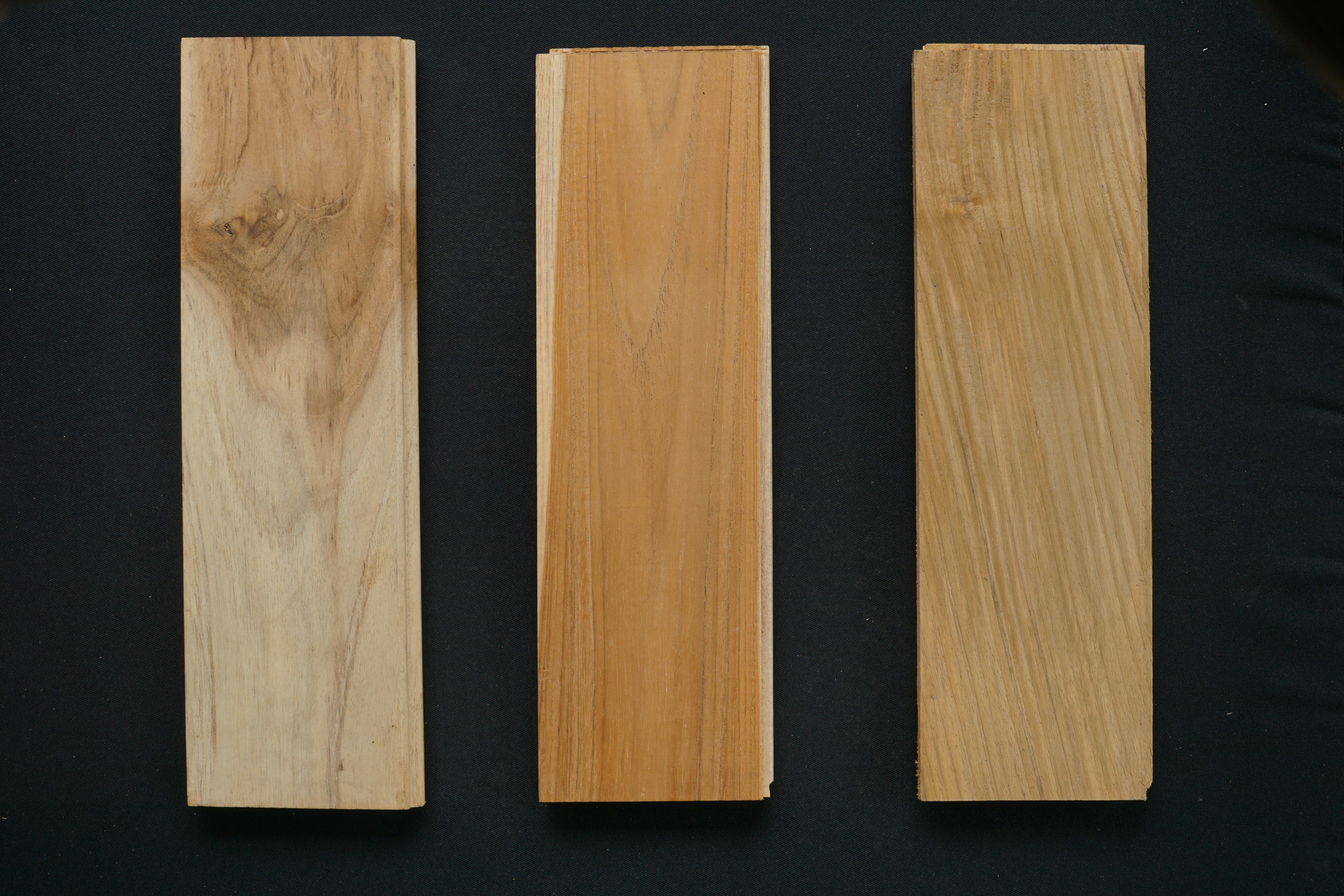 different timber decking wood samples side-by-side - timber decking suppliers near me
