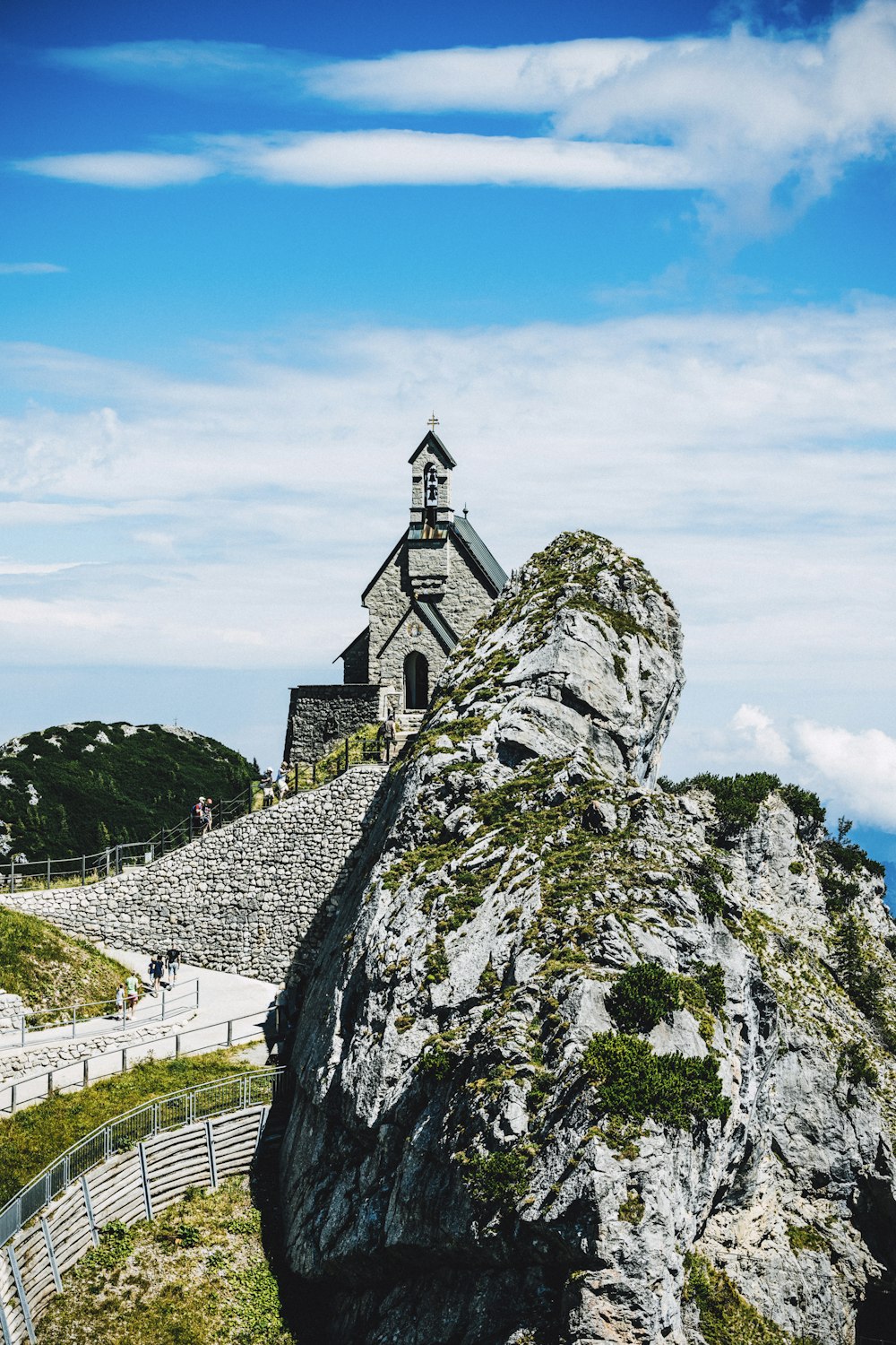 a large rock with a steeple on top of it