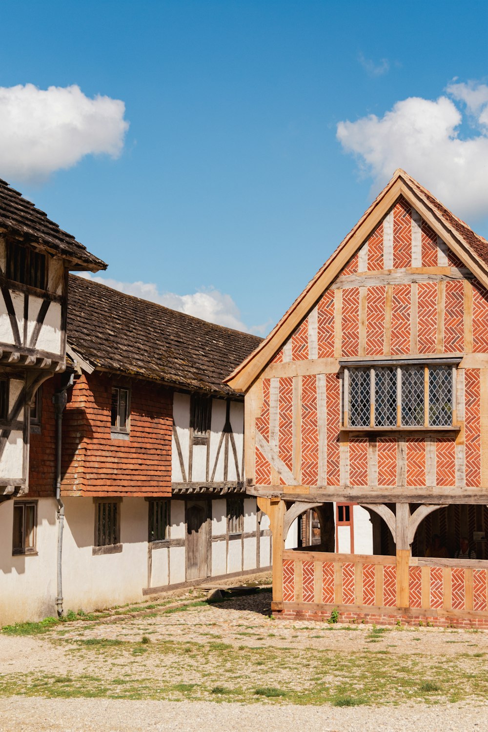 an old building with a horse standing in front of it