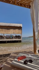 A serene beach setting with a private cabana and luxury amenities.