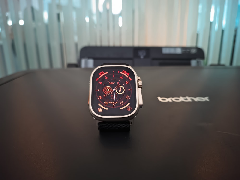 a close up of a smart watch on a table