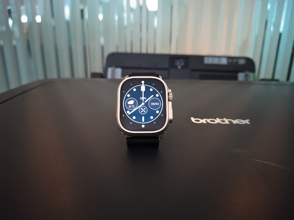 a smart watch sitting on top of a table