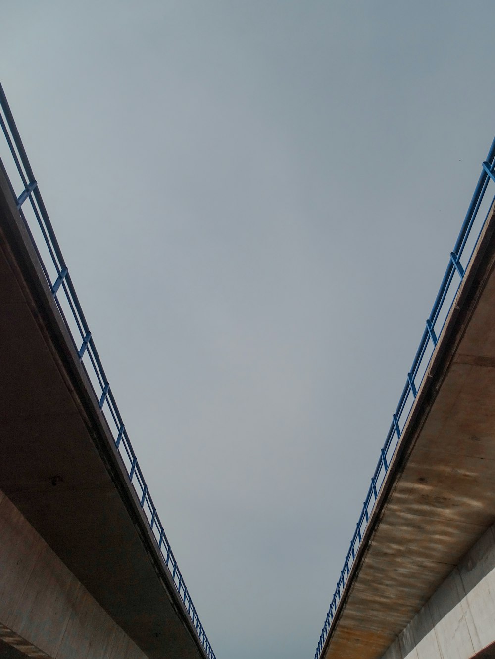 a view of the underside of a bridge from below