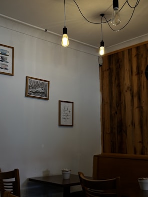 A cozy corner of the café with patrons enjoying their drinks.