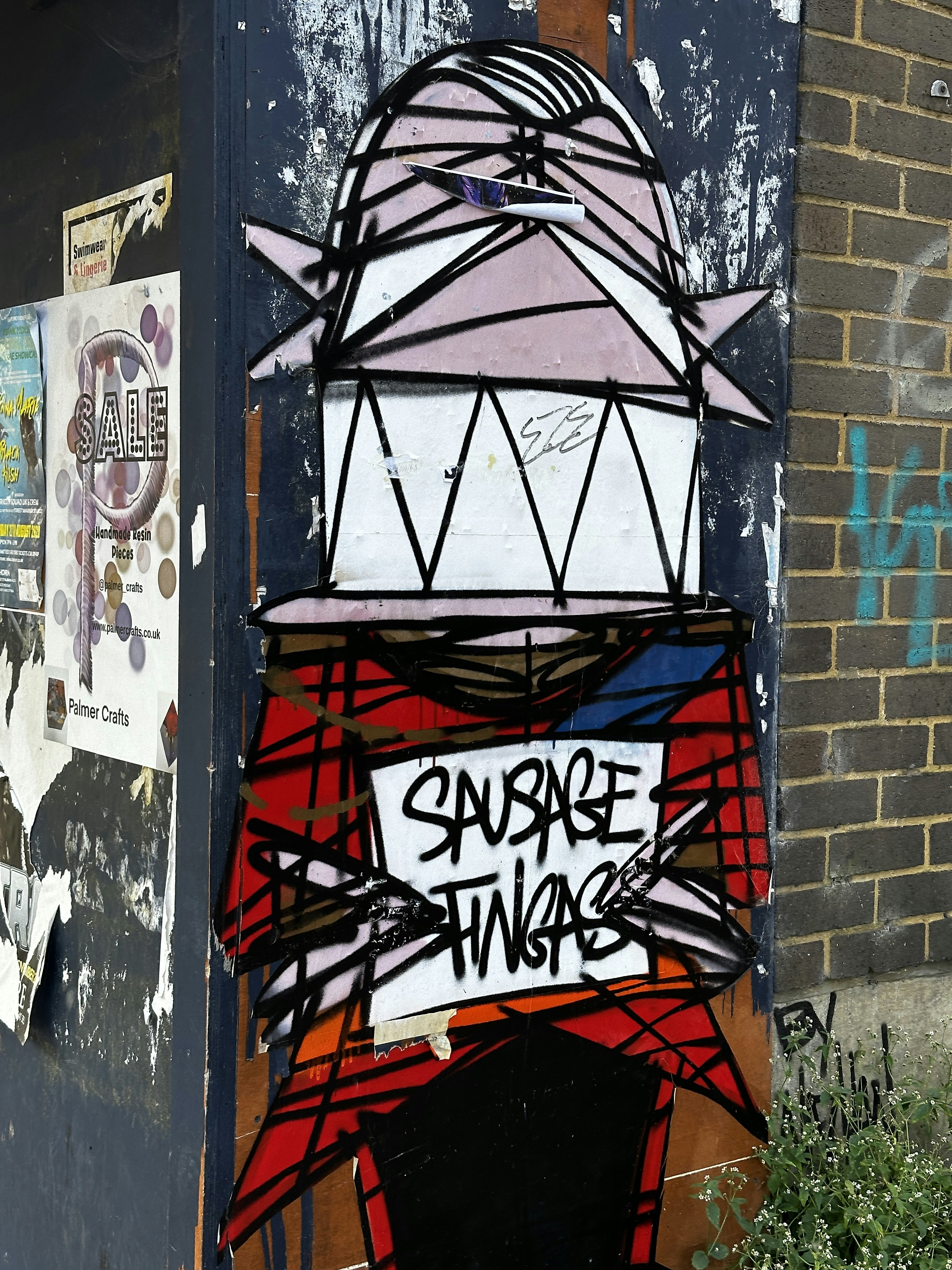a piece of art on the side of a building