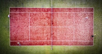 A vibrant tennis court with players in action.