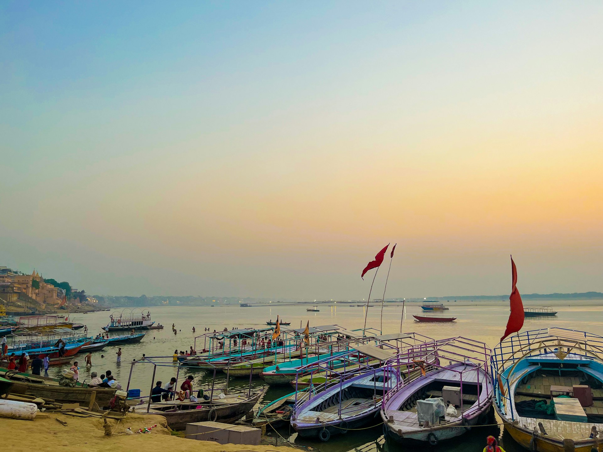 a group of boats that are sitting in the water