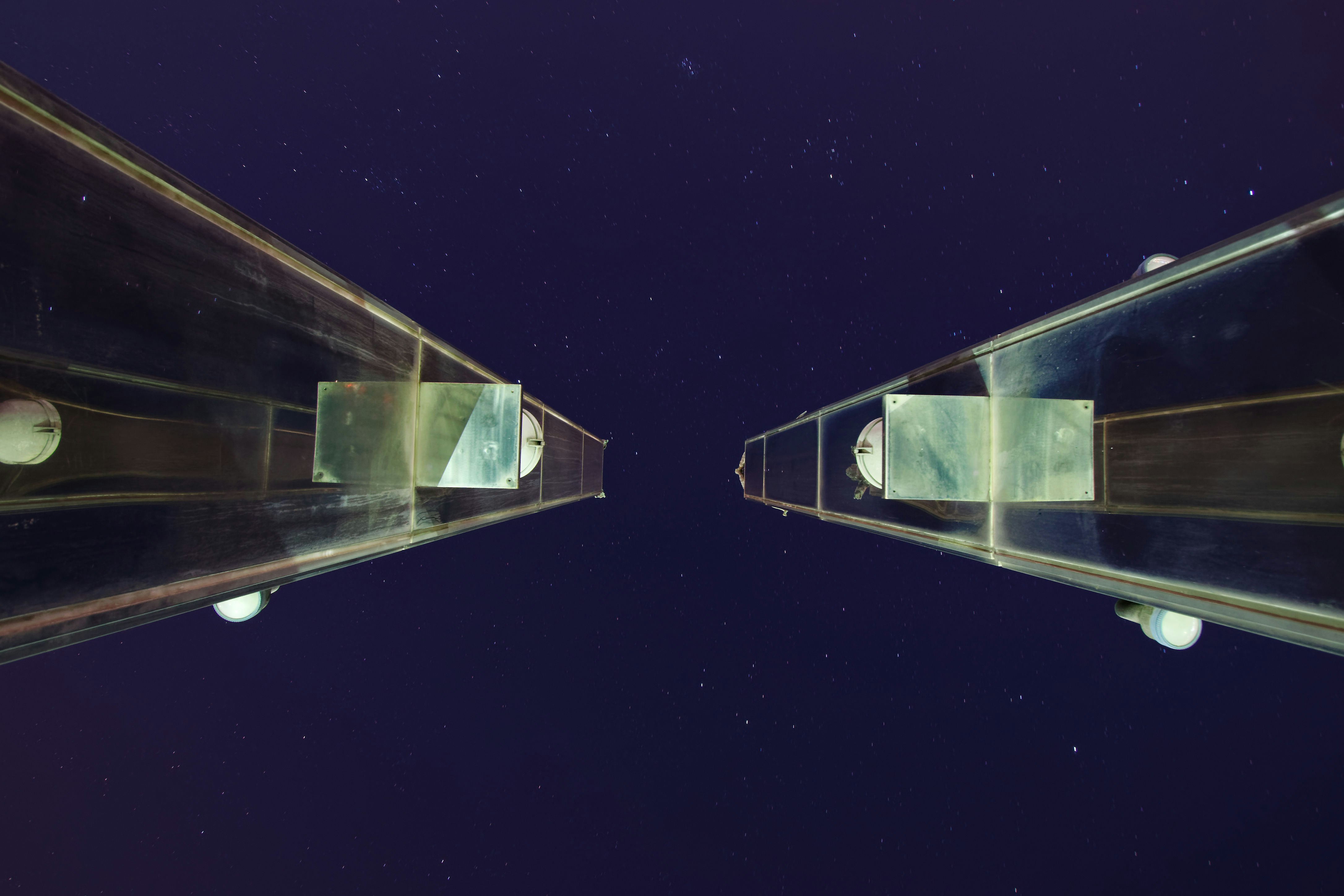 a reflection of a building in a mirror