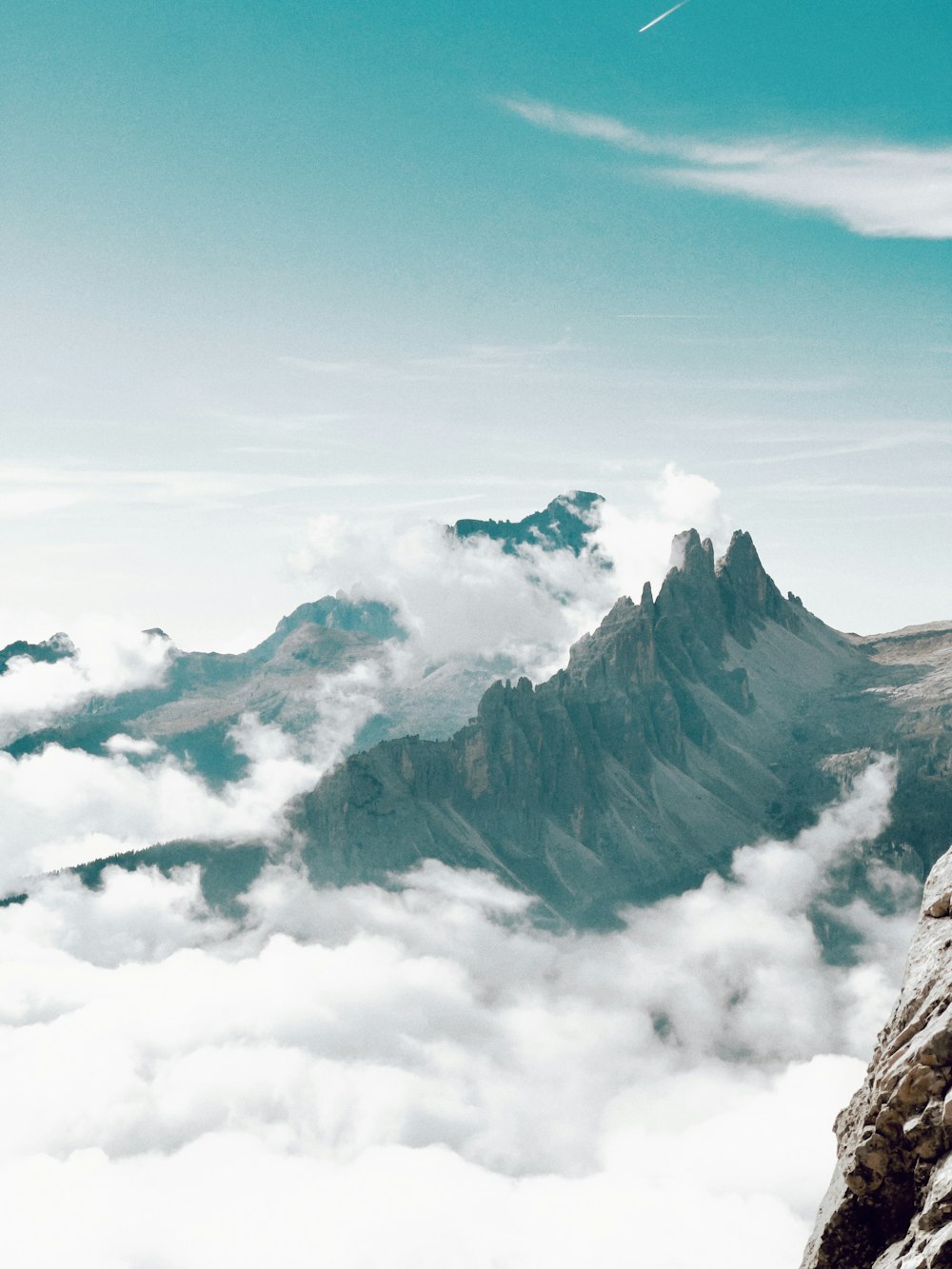 a man standing on top of a mountain