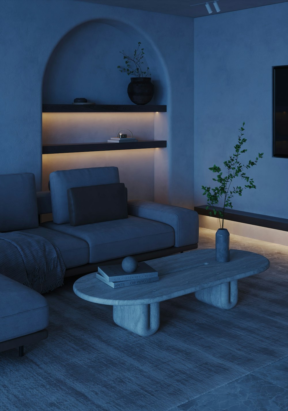 una sala de estar con un sofá y una mesa