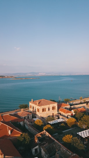 a large body of water sitting next to a city