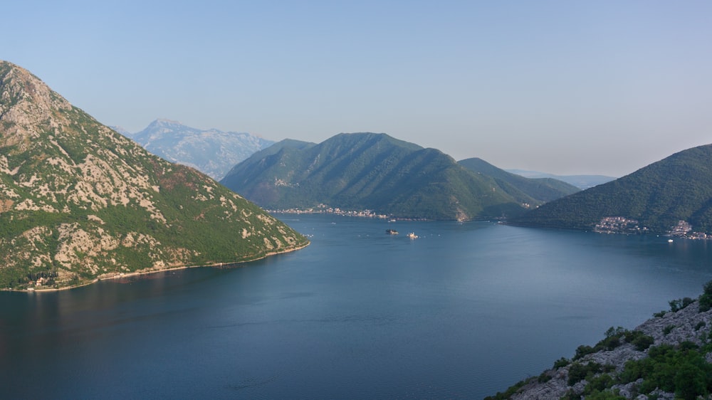 a large body of water surrounded by mountains