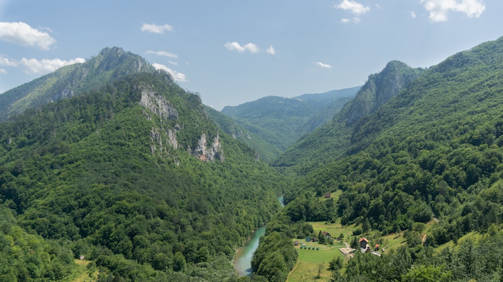 a valley with a river in the middle of it