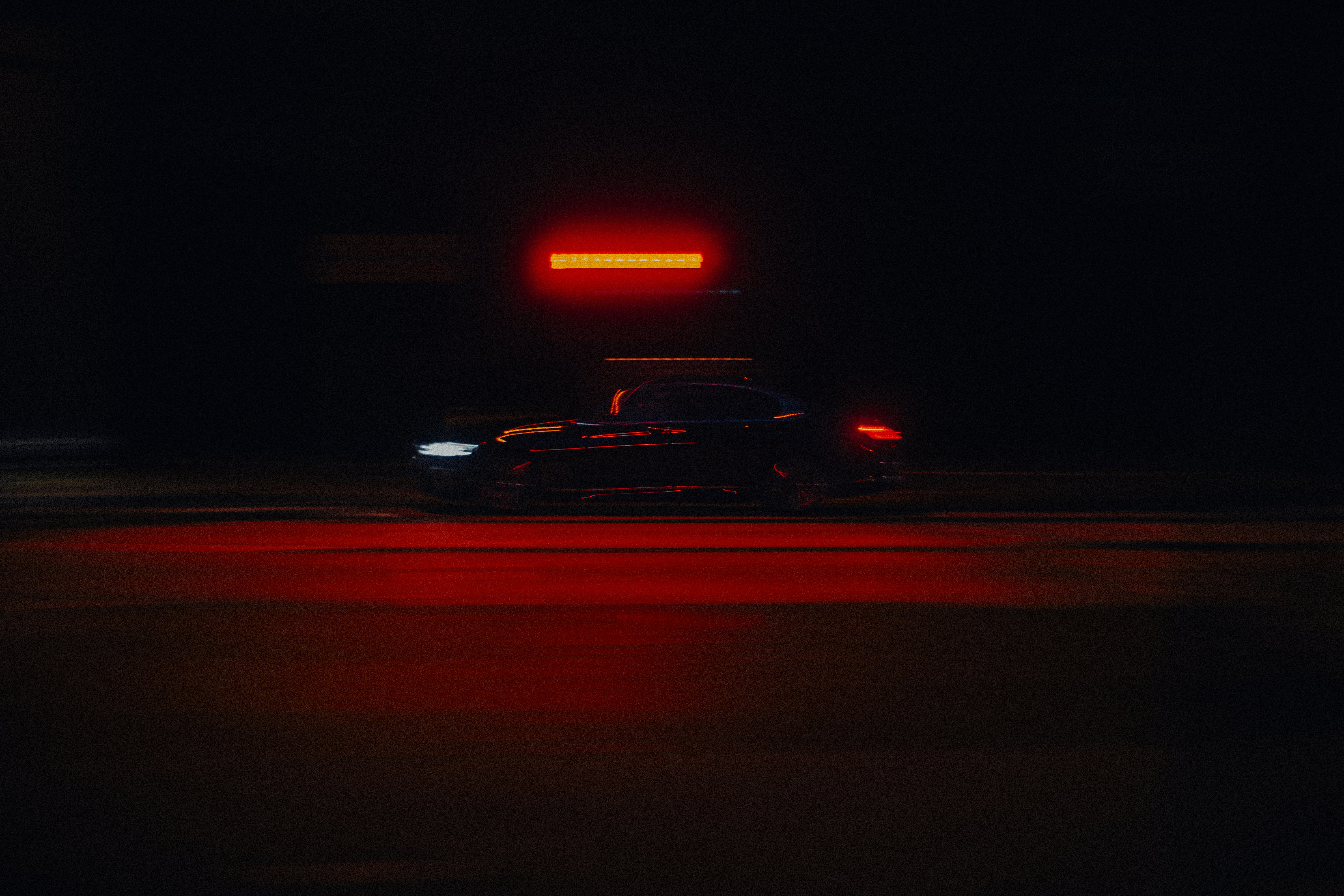 a police car at night with its lights on