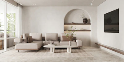 Modern living room featuring custom shelving and refined details in a minimalist setting.