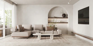 Modern living room featuring custom shelving and refined details in a minimalist setting.