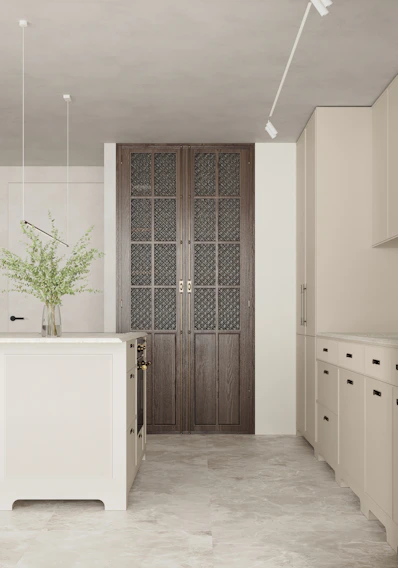 A sleek, modern kitchen renovation featuring clean lines, warm timber accents, and soft beige cabinetry.