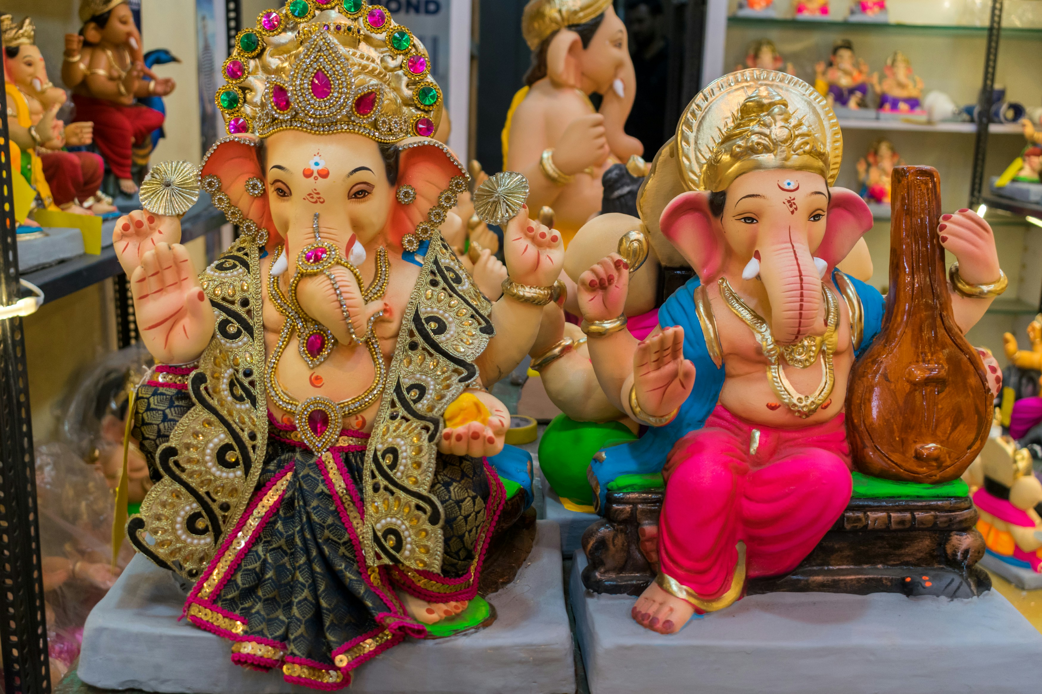 a statue of a couple of elephants sitting next to each other