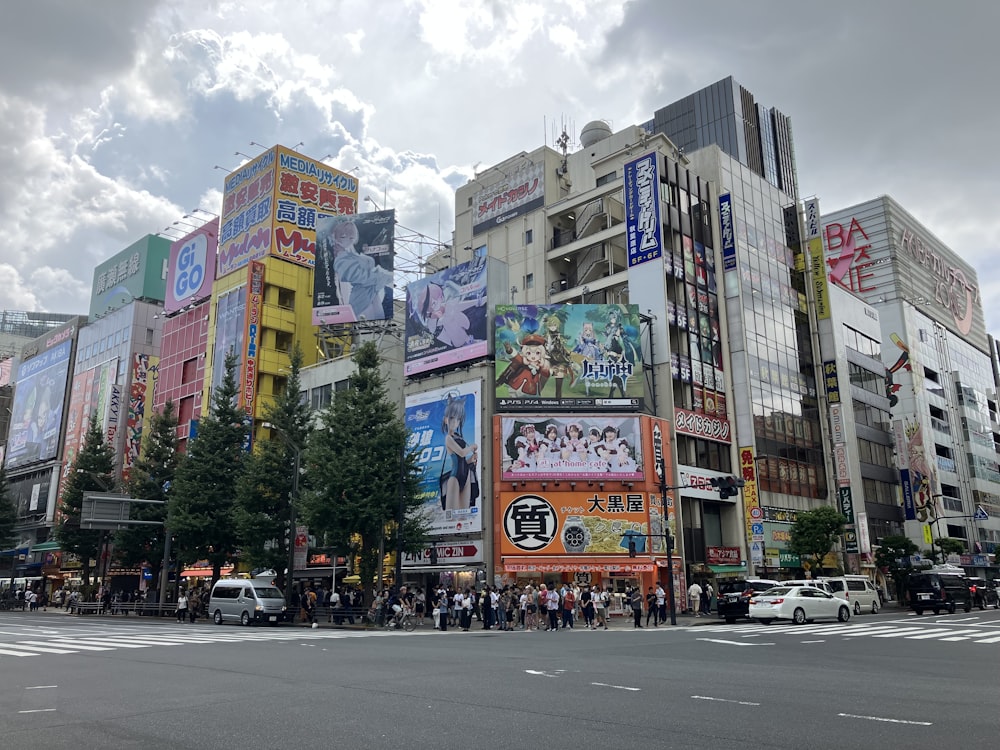 a city street filled with lots of tall buildings