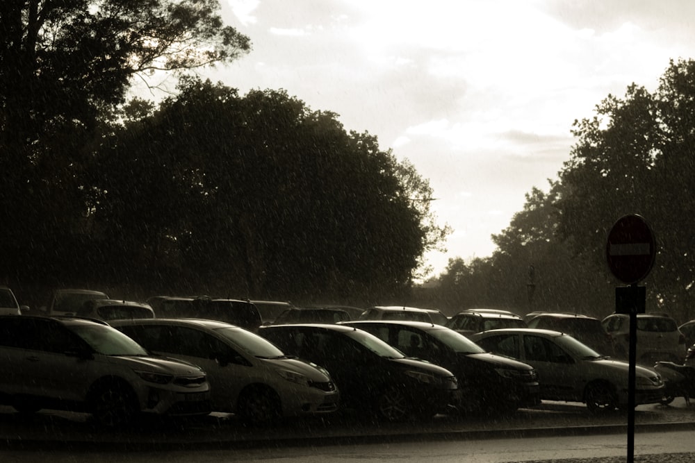 a parking lot filled with lots of parked cars