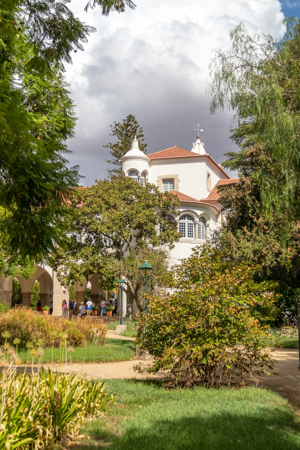 a large white house with a red roof