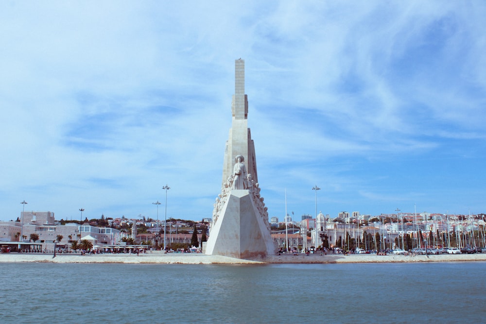 a large monument in the middle of a body of water