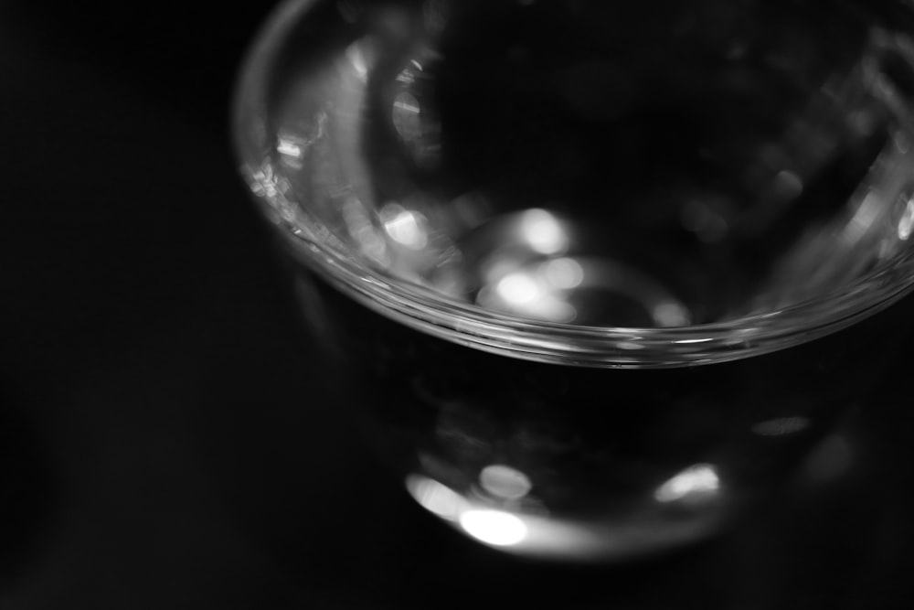 a black and white photo of a glass