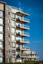 a tall building with balconies and balconies on the balconies