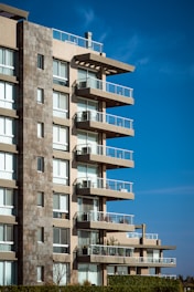 a tall building with balconies and balconies on the balconies