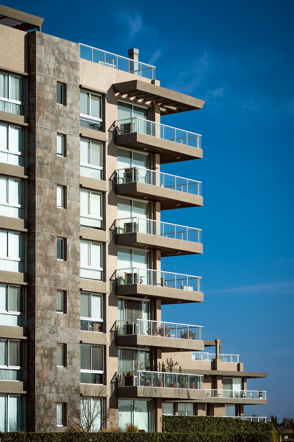 a tall building with balconies and balconies on the balconies