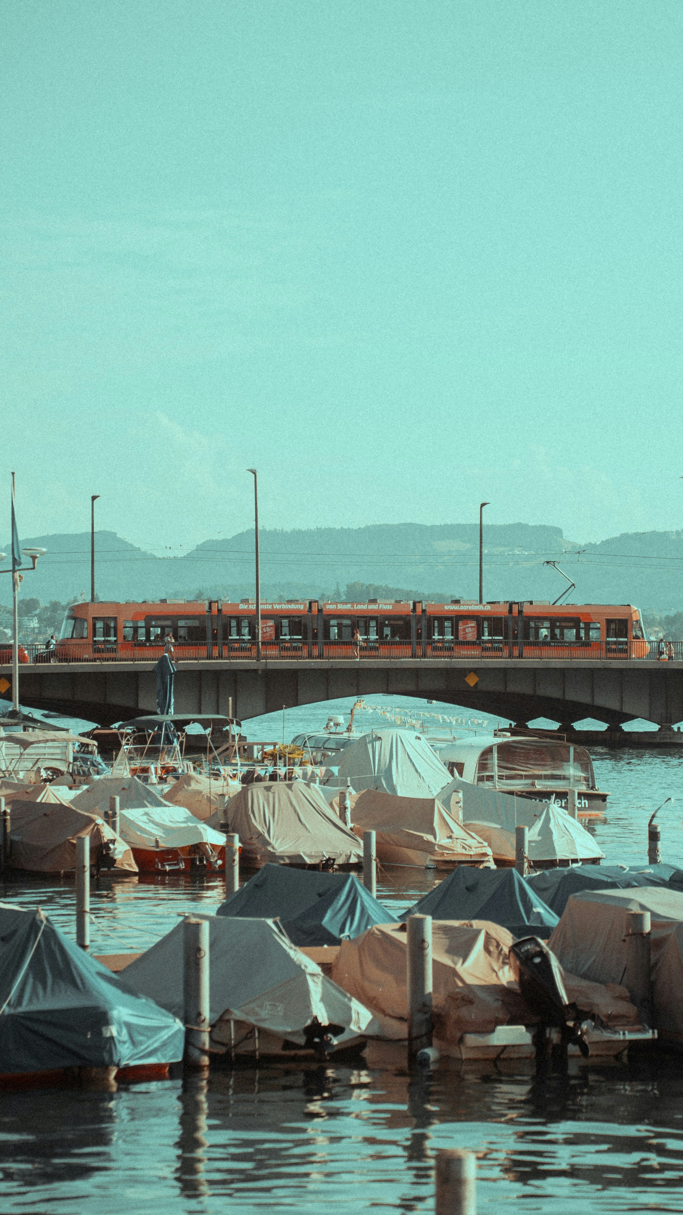a bunch of boats that are sitting in the water